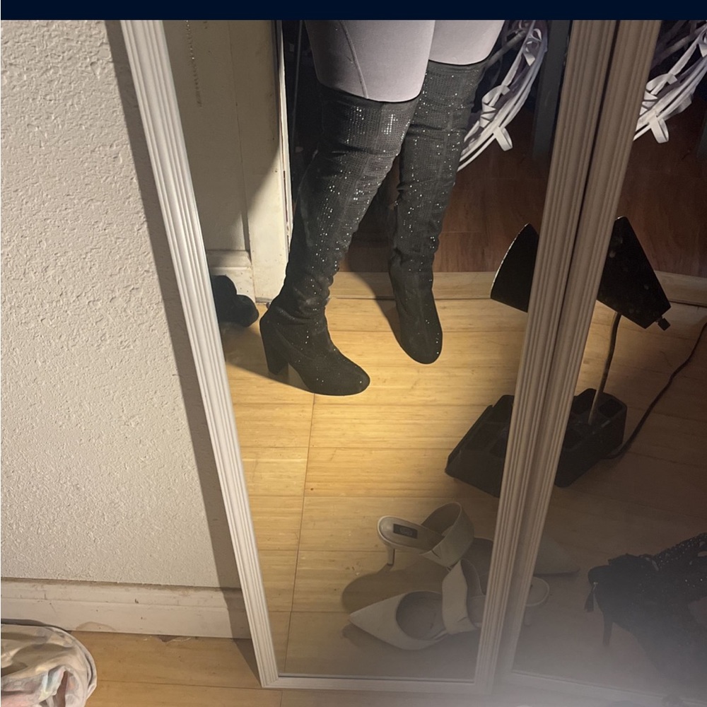 Heeled boots with diamonds all over them very comfortable and easy to walk in